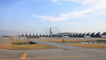 Photo for Suvarnabhumi Airport view, Airplane parking at passenger gate. - Royalty Free Image