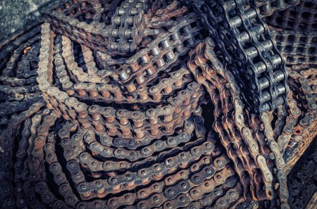 Texture of roller chains background. Rusty old chains, chain gear mechanism