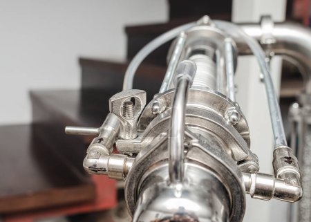 Shiny pipes of the unit for distilling alcohol at home