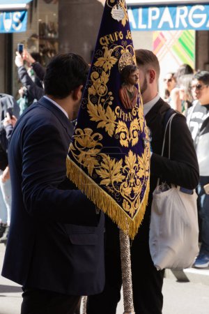 Photo for Madrid, Spain; 2nd April 2023: Procession of Holy Week on Palm Sunday, colloquially called "el borriquito" (the little donkey). Confraternity and banner of the gypsies. - Royalty Free Image