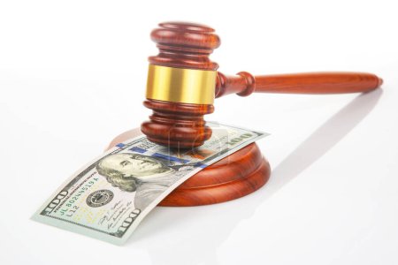 Photo for Gavel of justice on the background of dollars. corruption in law. buying a judgment - Royalty Free Image