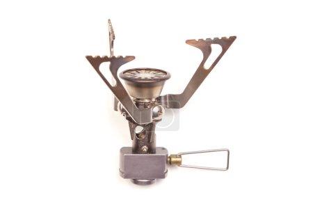 compact gas burner and lighter on a white background. tool for tourism and camping.