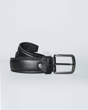mens black leather belt, This high-resolution photo features a mens black leather belt, a staple accessory in any wardrobe. Crafted with precision, the belt showcases premium quality