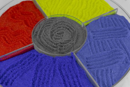 Photo for Close-Up Angle Of Multicolor In Round Container Rangoli Color Red, Yellow, Violet, Purple And Grey - Royalty Free Image