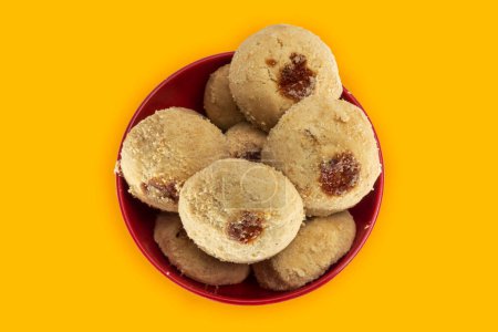 Photo for Many Round Nankhatai in Red Bowl - Royalty Free Image