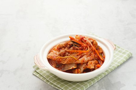 Photo for Kimchi or Kimci, a traditional Korean food, pickled fermented vegetables with a spicy seasoning - Royalty Free Image