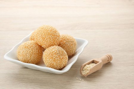 Photo for Onde-Onde, Indonesian traditional food, made from glutinous rice flour with beans pasta, wrapped in sesame seeds. - Royalty Free Image