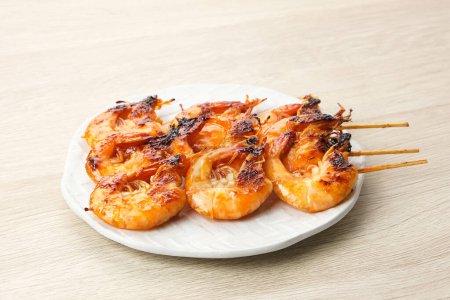 Photo for Udang Bakar Madu, Grilled Shrimp with honey, made from shrimp seasoned with chilli sauce, pepper and honey - Royalty Free Image