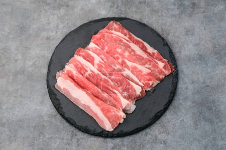Photo for Sliced fresh raw beef. This is beef that most people in the slice call shortplate. - Royalty Free Image