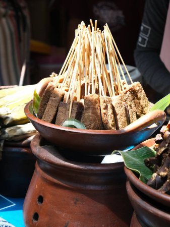 Photo for Sate Kere, a typical Solo (Indonesia) culinary dish made from tofu dregs. - Royalty Free Image