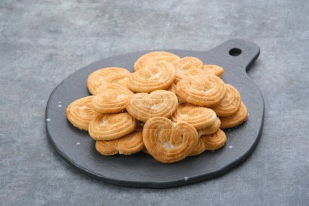 Photo for Tasty Almond Cookies with heart shape - Royalty Free Image