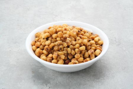Marning, heap of crispy roasted corn kernels, traditional snack from Indonesia