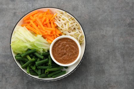 Pecel Sayur, Indonesian traditional salad, mix steamed vegetable with peanut sauce