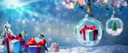 Photo for Christmas Gift Present In Ball Hanging - Royalty Free Image
