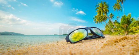 Photo for Sunglasses on the beach - Royalty Free Image