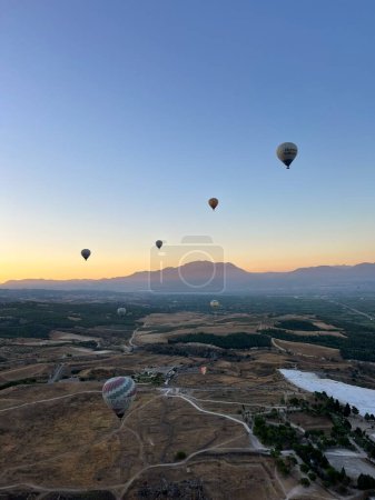 Photo for A sunset hot air balloon ride, Pamukkale, Turkey - Royalty Free Image