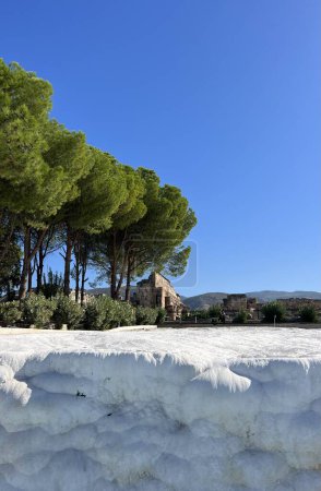 The breathtaking view of the Travertine terraces in Pamukkale, Turkey, where the stunning landscape showcases the natural wonder of calcium deposits and mineral formations
