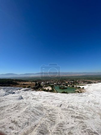 The breathtaking view of the Travertine terraces in Pamukkale, Turkey, where the stunning landscape showcases the natural wonder of calcium deposits and mineral formations
