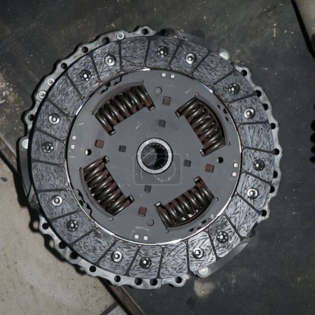 Photo for Closeup of a clutch plate with friction disc and torsion springs in a garage during service and replacement - Royalty Free Image
