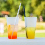 Orange cocktail Spritz and lemonade, refreshing summer drinks on the terrace in the park.