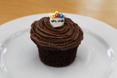 Photo for Ready to be eaten, a cup cake has been taken out of its liner - Royalty Free Image
