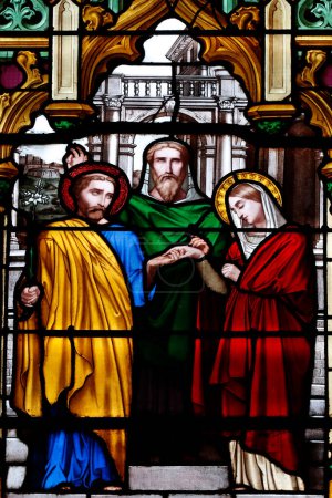 Téléchargez les photos : Saint Pierre cathedral.  The marriage of the Virgin Mary and Saint Joseph. Stained glass window.  Annecy. France. - en image libre de droit