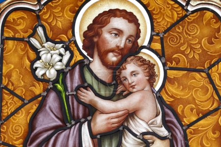 Photo for St Joseph with Infant Christ in his arms.  Stained glass window. Thi Nghe Church.  Ho Chi Minh City. Vietnam. - Royalty Free Image