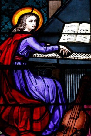 Photo for Antsirabe cathedral. Stained glass window. Saint Cecilia playing the pipe organ. Madagascar. - Royalty Free Image