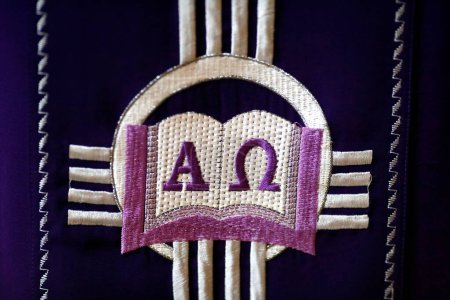 Photo for Purple roman chasuble with Alpha and Omega - Royalty Free Image
