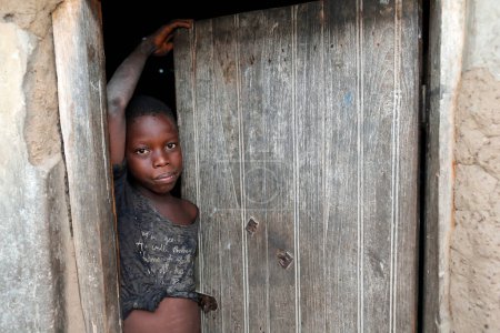 Téléchargez les photos : African village. Young african boy. Portrait.  Datcha-Attikpaye. Togo. - en image libre de droit