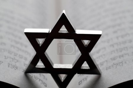 Jewish star or star of David on a Torah.  Religious symbol.-stock-photo