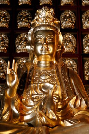 Photo for Khai Doan King Honored Pagoda.  Quan Am  ( Guan Yin),   the Bodhisattva of Compassion (Goddess of Mercy).  Buon Me Thuot. Vietnam. - Royalty Free Image