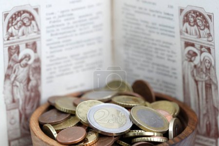 Photo for Catholic finance and economy concept with bible  euro coins. - Royalty Free Image