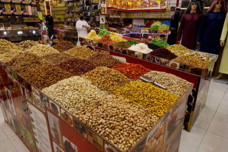 Photo for Arabian nuts,seeds and dried fruit on display in a shop in the spice souk in Deira.  Dubai.  United Arab Emirates. - Royalty Free Image