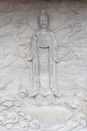 Photo for Linh Ung buddhist pagoda. Avalokitesvara  ( Quan Am), the Bodhisattva of compassion or goddess of Mercy. Danang. Vietnam. - Royalty Free Image