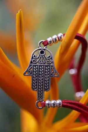 Photo for Muslim Hamsa amulet, also known of the hand of Fatima or the hand of Mary. - Royalty Free Image