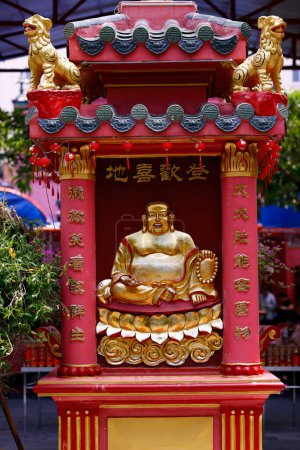 Kaiser Jade Pagode (Chua Ngoc Hoang oder Phuoc Hai Tu). Taoistischer Tempel. Glücklich lächelnder Buddha. Maitreya Buddha. Ho-Chi-Minh-Stadt. Vietnam. 