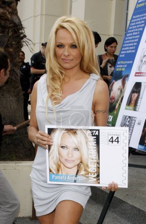 Photo for PETA Goes Postal: Pamela Anderson Unveils Vegetarian Icons Postage Sheet held at the Hollywood Post Office in Hollywood, USA on November 29, 2011. - Royalty Free Image