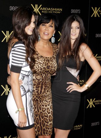 Photo for HOLLYWOOD, CA - AUGUST 17, 2011: Kylie Jenner, Kris Jenner and Kendall Jenner at the Kardashian Kollection Launch Party held at the Colony in Hollywood, USA on August 17, 2011. - Royalty Free Image