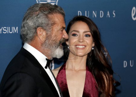 Foto de Mel Gibson y Rosalind Ross en el Art Of Elysium 's 12th Annual Heaven Celebration celebrado en el Private Venue en Los Ángeles, EE.UU. el 5 de enero de 2019
. - Imagen libre de derechos