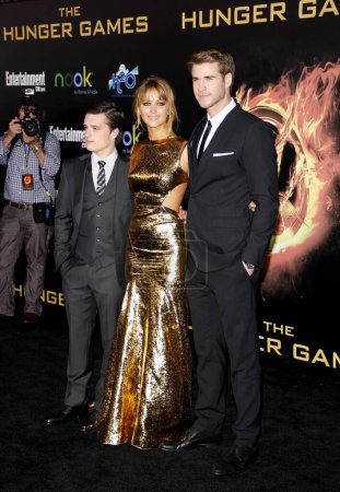 Photo for Josh Hutcherson, Jennifer Lawrence and Liam Hemsworth at the Los Angeles premiere of 'The Hunger Games' held at the Nokia Theatre L.A. Live in Los Angeles on March 12, 2012. - Royalty Free Image