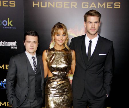 Photo for Josh Hutcherson, Jennifer Lawrence and Liam Hemsworth at the Los Angeles premiere of 'The Hunger Games' held at the Nokia Theatre L.A. Live in Los Angeles on March 12, 2012. - Royalty Free Image