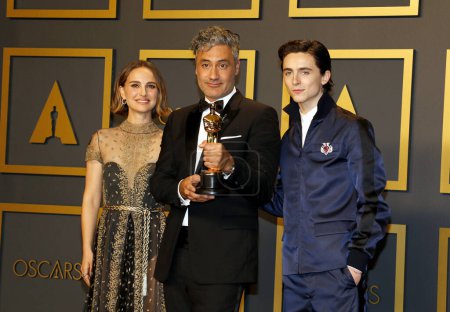 Photo for Timothee Chalamet, Natalie Portman, Taika Waititi at the 92nd Academy Awards - Press Room held at the Dolby Theatre in Hollywood, USA on February 9, 2020. - Royalty Free Image