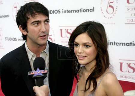 Photo for Rachel Bilson and Josh Schwartz at the 75th Diamond Jubilee Celebration for the USC School of Cinema-Television held at the USC's Bovard Auditorium in Los Angeles, USA on September 26, 2004. - Royalty Free Image