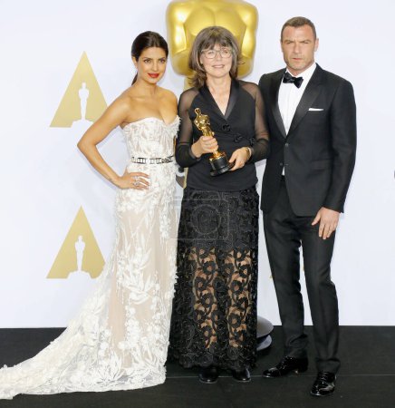 Photo for Liev Schreiber, Margaret Sixel and Priyanka Chopra at the 88th Annual Academy Awards - Press Room held at the Loews Hollywood Hotel in Hollywood, USA on February 28, 2016. - Royalty Free Image