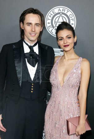 Photo for Victoria Justice and Reeve Carney at the Art Of Elysium's 11th Annual Heaven Celebration held at the Barker Hangar in Santa Monica, USA on January 6, 2018. - Royalty Free Image