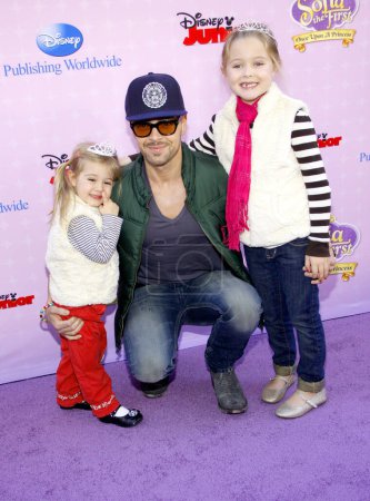 Photo for Joey Lawrence, daughters Liberty Grace Lawrence and Charleston Lawrence at the Los Angeles premiere of 'Sofia the First: Once Upon a Princess' held at the Disney Studios in Los Angeles, USA on November 10, 2012. - Royalty Free Image