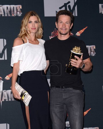 Photo for Mark Wahlberg and Rhea Durham at the 2014 MTV Movie Awards - Press Room held at the Nokia Theatre L.A. Live in Los Angeles, USA on April 13, 2014. - Royalty Free Image