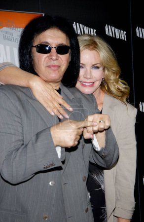 Photo for Gene Simmons and Shannon Tweed at the Los Angeles premiere of 'Haywire' held at the DGA Theater in Hollywood, USA on January 5, 2012. - Royalty Free Image