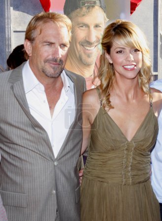 Photo for Kevin Costner and Christine Baumgartner at the Los Angeles premiere of 'Swing Vote' held at the El Capitan Theater in Hollywood on July 24, 2008. - Royalty Free Image
